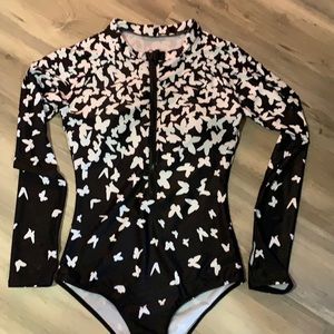 Long sleeve swim suit size 8 good for sun protection.